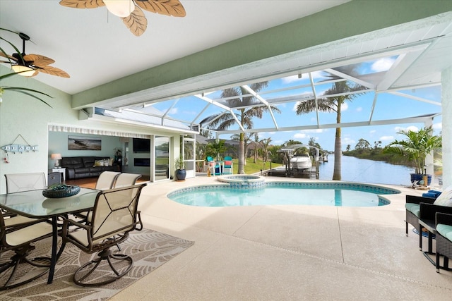 view of swimming pool featuring glass enclosure, an in ground hot tub, a water view, and a patio