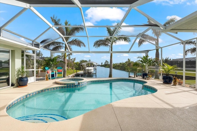 view of pool featuring glass enclosure, an in ground hot tub, a water view, and a patio