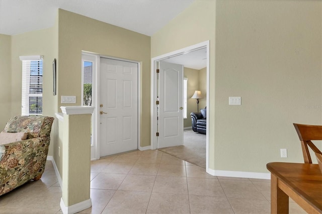 view of tiled foyer entrance