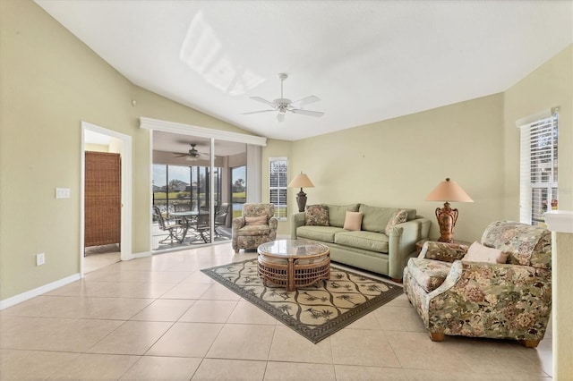 tiled living room featuring lofted ceiling and ceiling fan