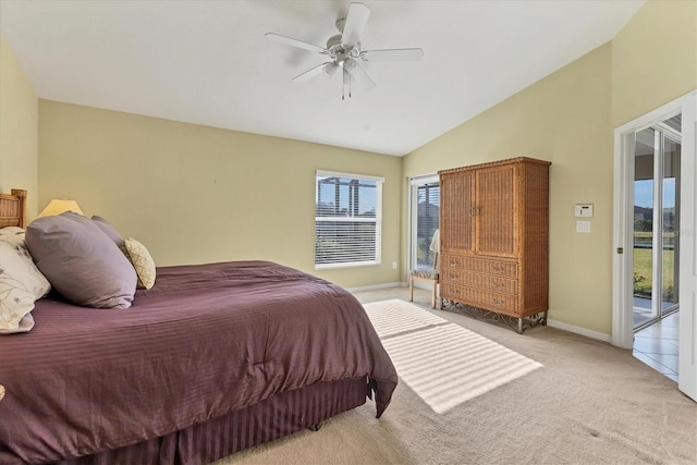 bedroom with multiple windows, lofted ceiling, light carpet, and access to outside