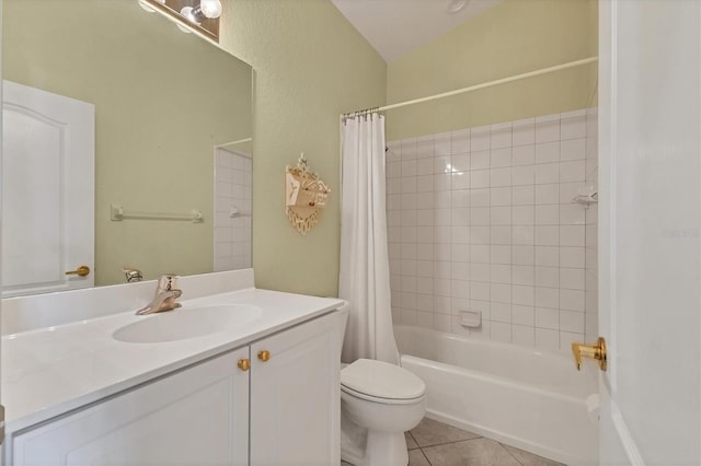 full bathroom with vanity, toilet, tile patterned flooring, and shower / bath combo