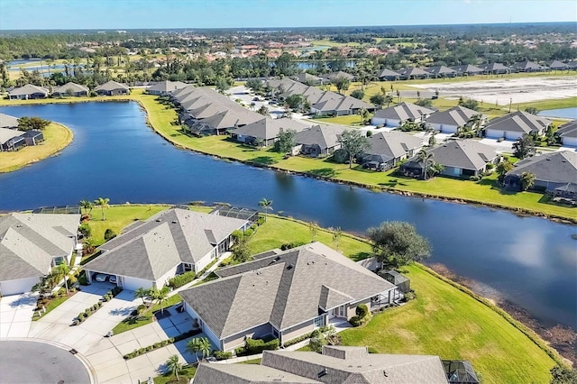 bird's eye view with a water view