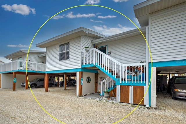 exterior space with a carport