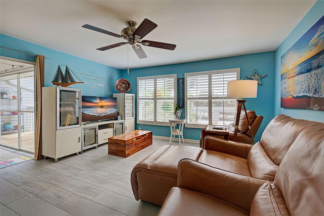 living room with ceiling fan