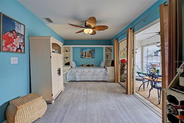 bedroom featuring light hardwood / wood-style flooring and ceiling fan