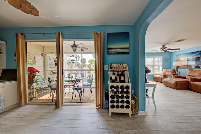 interior space featuring ceiling fan