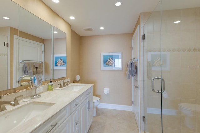 bathroom with toilet, vanity, tile patterned flooring, and an enclosed shower