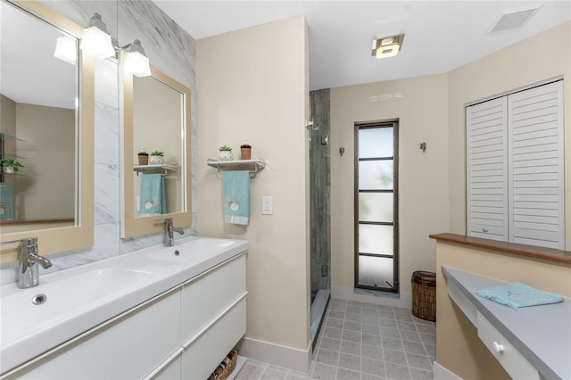 bathroom with walk in shower and vanity