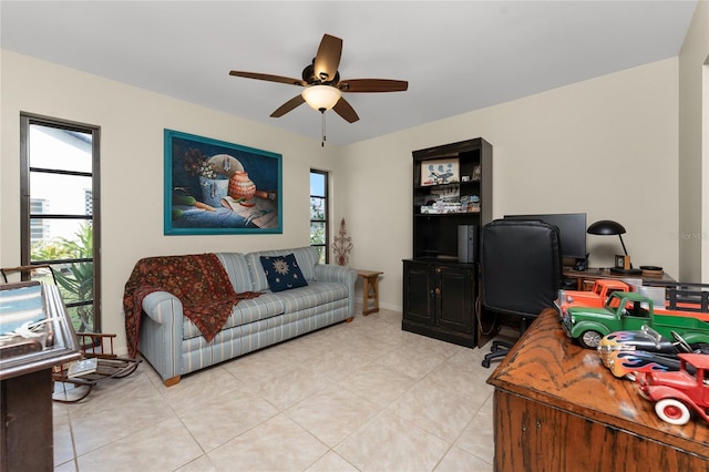 tiled office space with ceiling fan