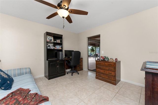 office featuring ceiling fan and light tile patterned flooring