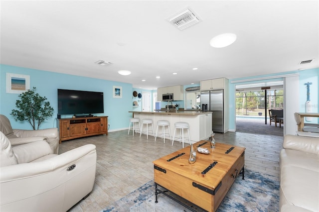 living room featuring light hardwood / wood-style floors