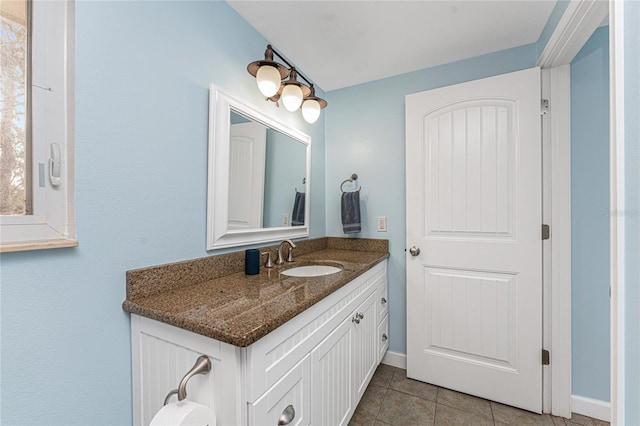 bathroom featuring vanity and tile patterned flooring