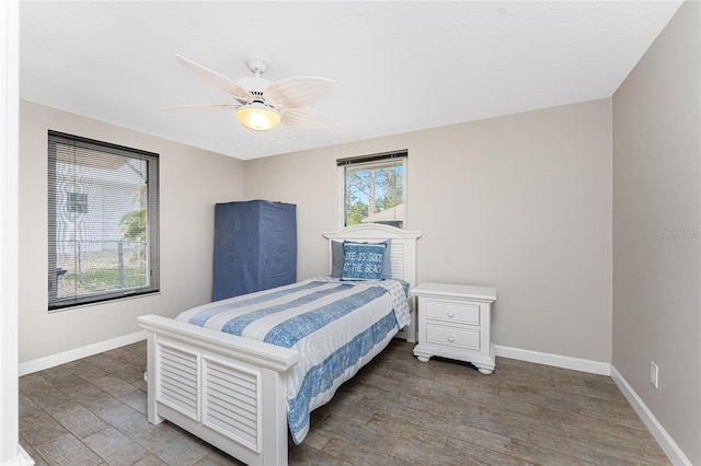 bedroom featuring hardwood / wood-style flooring and ceiling fan