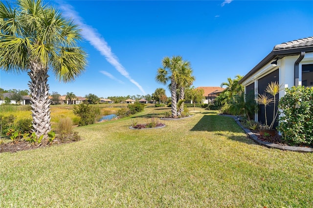 view of yard featuring a water view