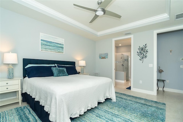 tiled bedroom featuring ceiling fan, ensuite bath, and ornamental molding