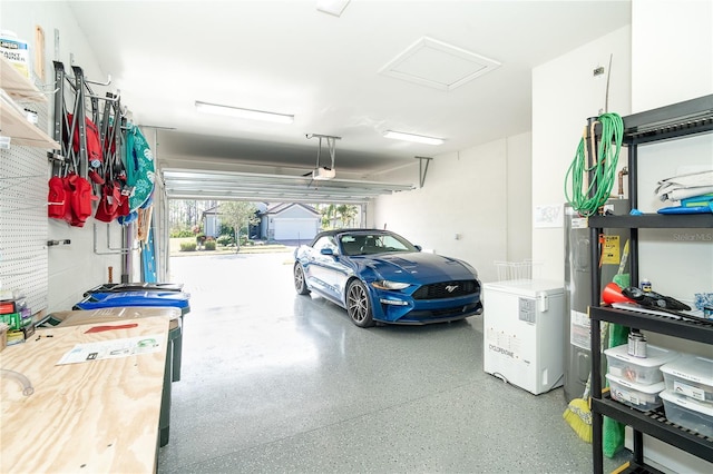 garage featuring a garage door opener