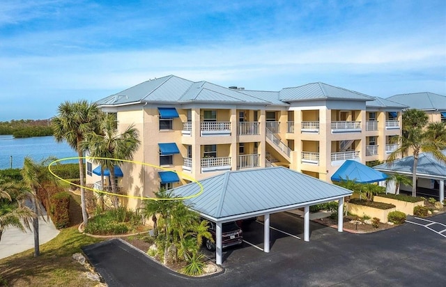 view of building exterior featuring a water view