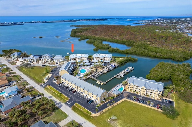 birds eye view of property featuring a water view