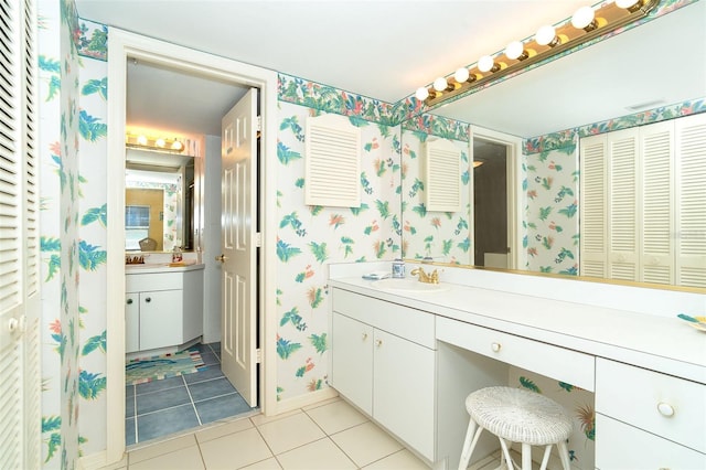 bathroom with vanity and tile patterned floors