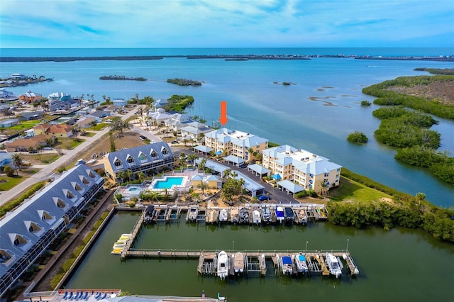 birds eye view of property featuring a water view