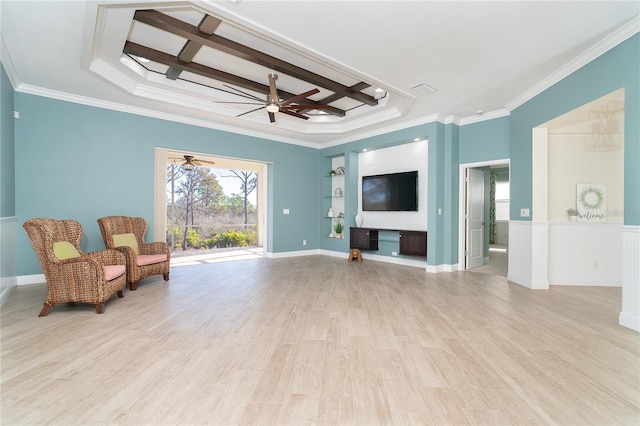 living area with ceiling fan, ornamental molding, coffered ceiling, and light wood-type flooring