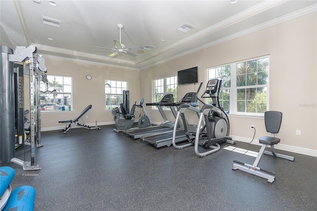 exercise room featuring ornamental molding and ceiling fan