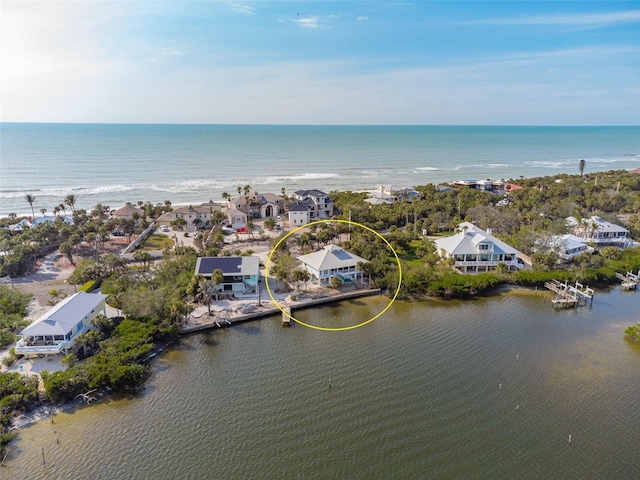 bird's eye view with a water view