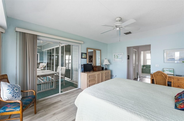 bedroom with a textured ceiling, light hardwood / wood-style floors, access to exterior, and ceiling fan