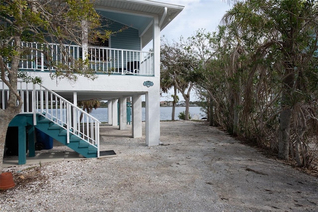 view of home's exterior featuring a water view