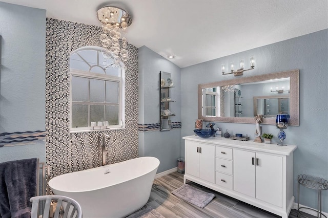 bathroom featuring vanity and a bathtub