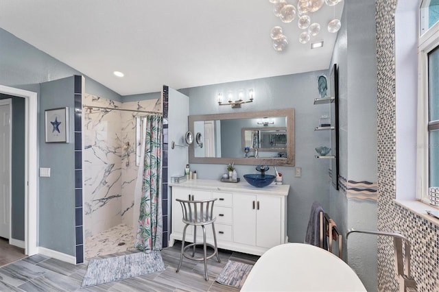 bathroom with vanity and curtained shower