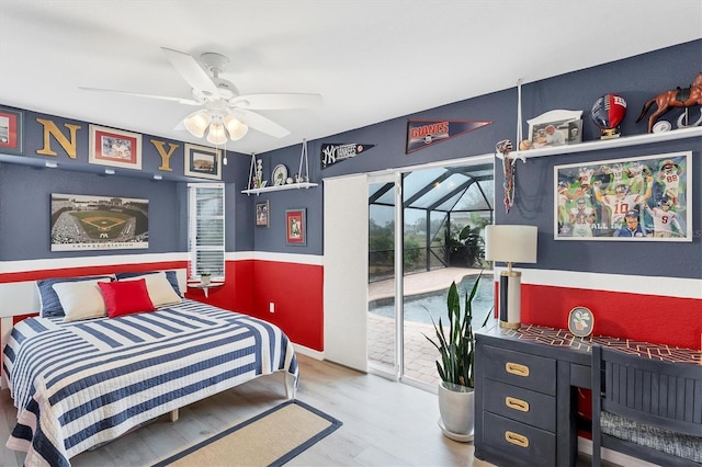 bedroom featuring access to outside, ceiling fan, and light hardwood / wood-style flooring