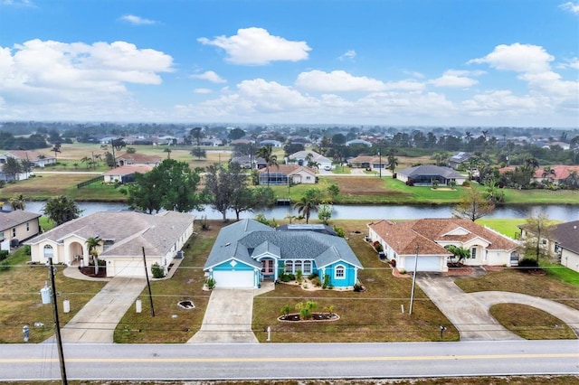 bird's eye view with a water view