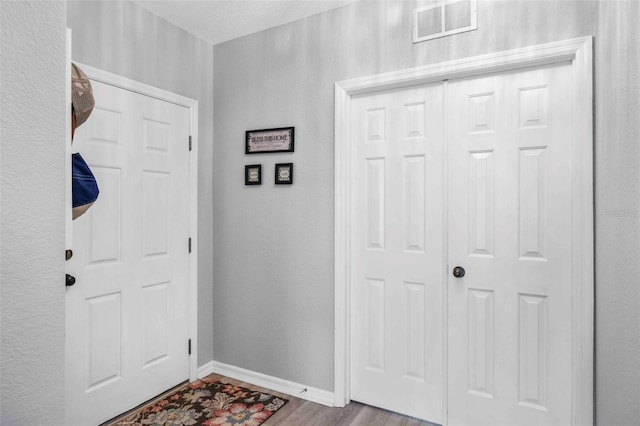 entryway featuring light hardwood / wood-style floors