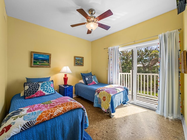 bedroom featuring ceiling fan and access to outside