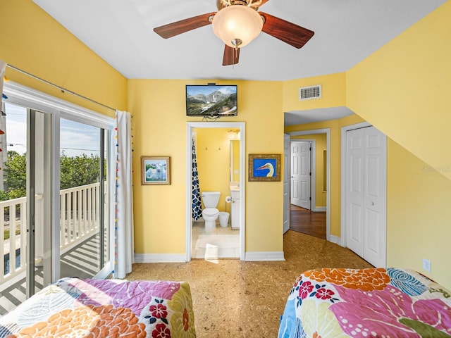 bedroom featuring ceiling fan, ensuite bath, and access to outside