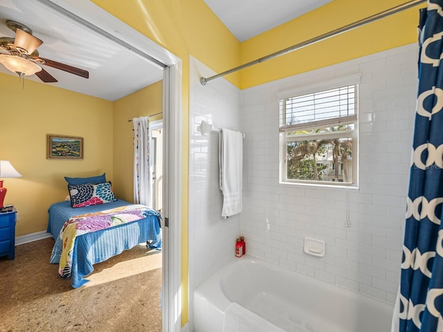 bathroom with shower / tub combo with curtain and ceiling fan