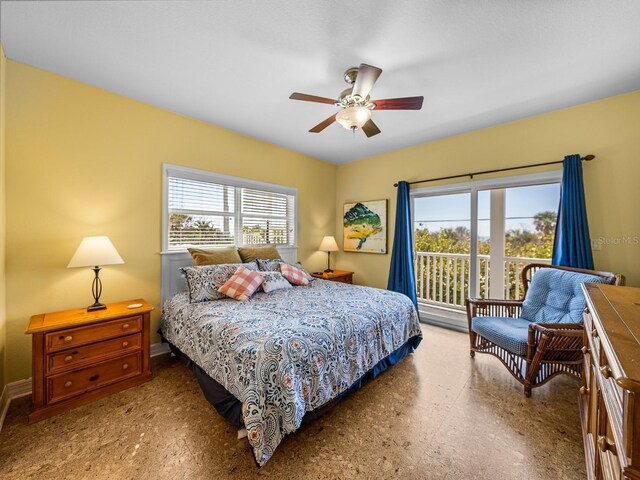 bedroom featuring ceiling fan and access to outside