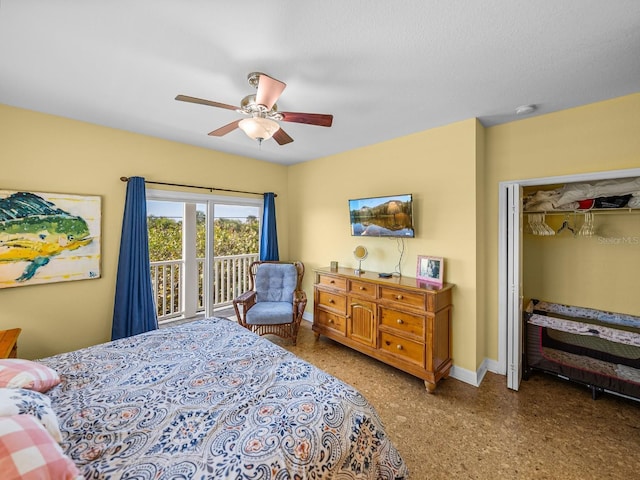 bedroom with access to exterior and ceiling fan