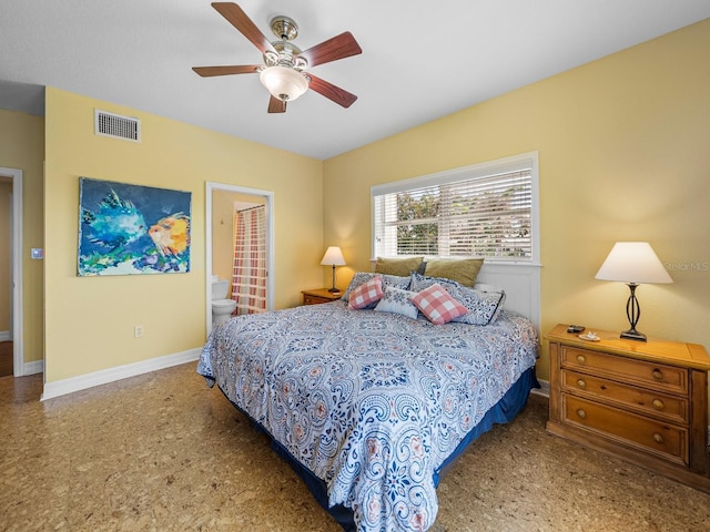 bedroom with connected bathroom and ceiling fan