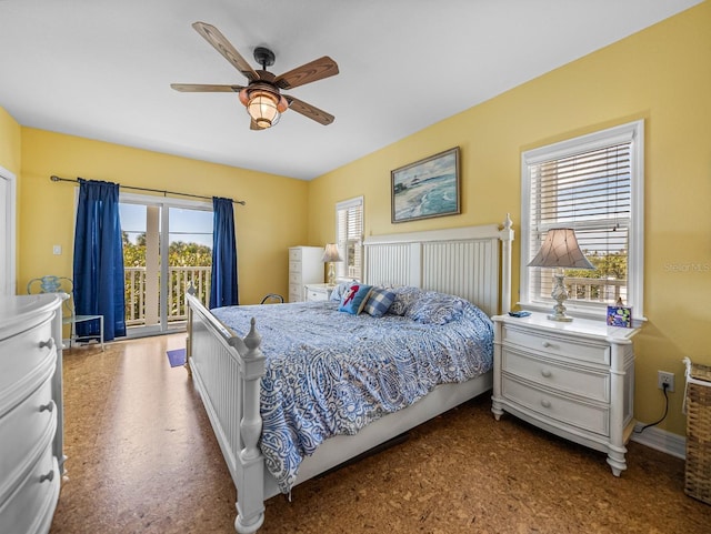 bedroom with ceiling fan and access to outside