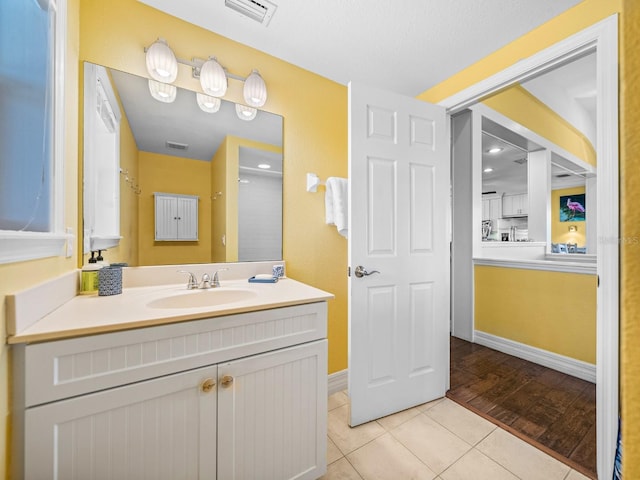 bathroom featuring vanity and tile patterned floors