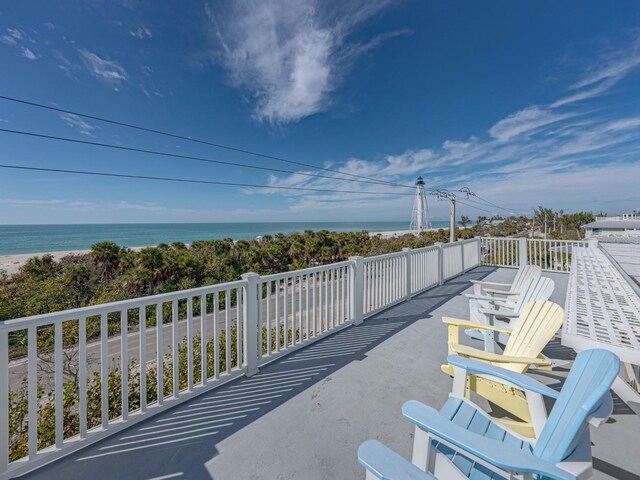 view of patio with a water view