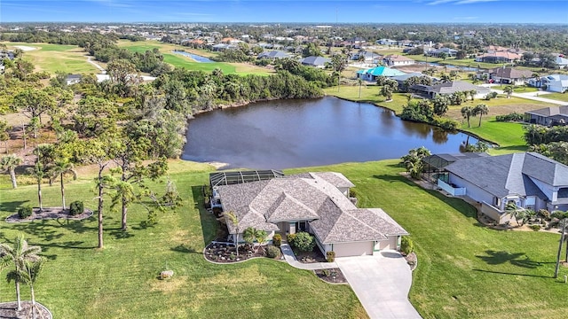 aerial view with a residential view and a water view