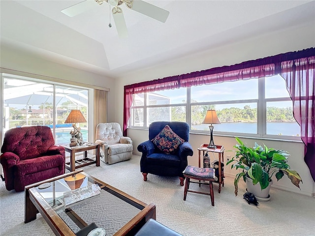 sunroom featuring vaulted ceiling and ceiling fan