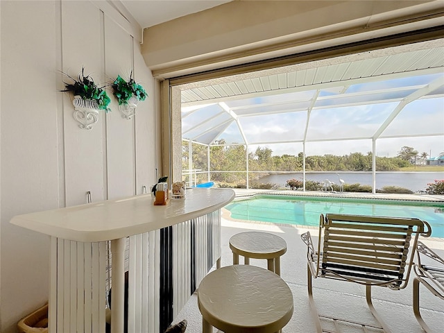 view of pool featuring a water view