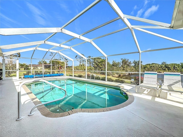 view of pool with a lanai, a patio, and a water view