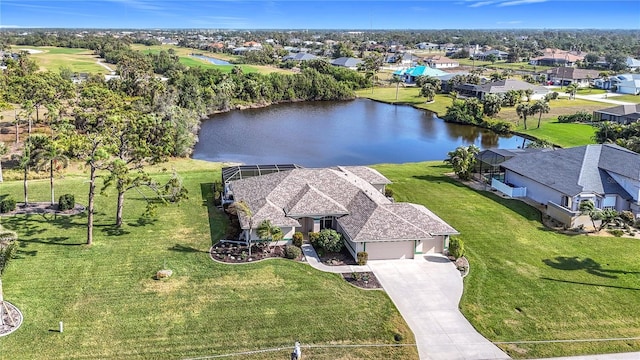 aerial view featuring a residential view and a water view