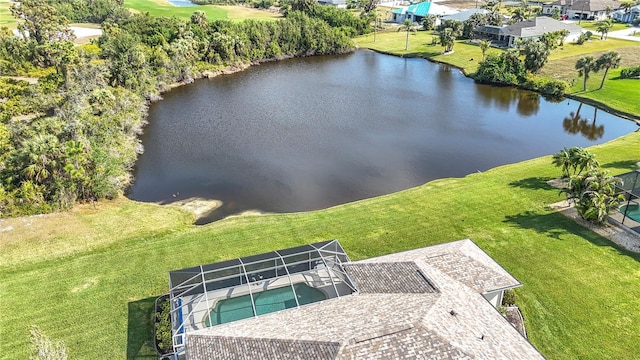 birds eye view of property with a water view